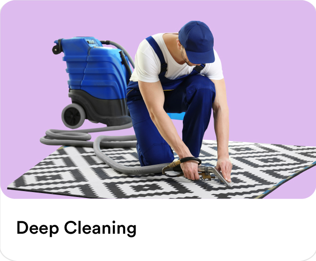 Home cleaning specialist using an industrial floor machine for deep cleaning services on carpets and tiled floors.