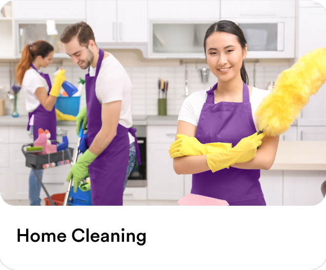 Professional maids in purple uniforms scrubbing kitchen counters and dust-cleaning surfaces for hourly house cleaning services.