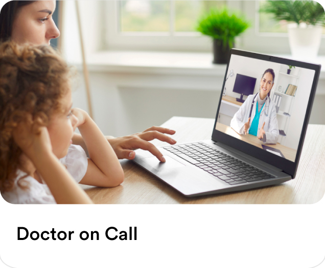  Mother and child consulting a female physician on a laptop screen for telemedicine and doctor on call home visit services in the UAE.